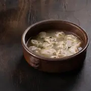 Пельмени из оленины в горшочке