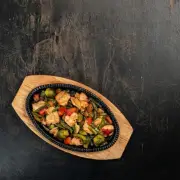 Куриное филе жареное с овощами