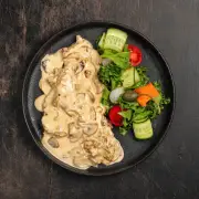 Телятина тушёная в сливках